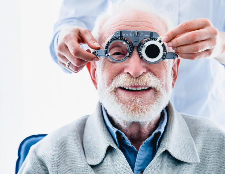 Older man getting an eye exam